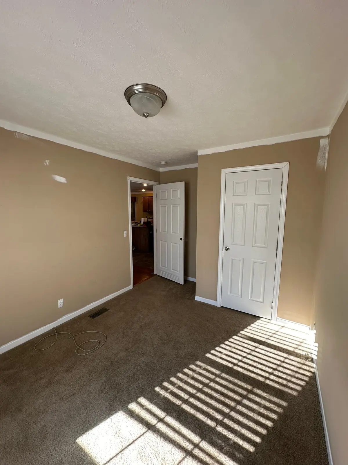 Bedrooms Carpet Replaced with Wood-Look Floor — Before photo 2