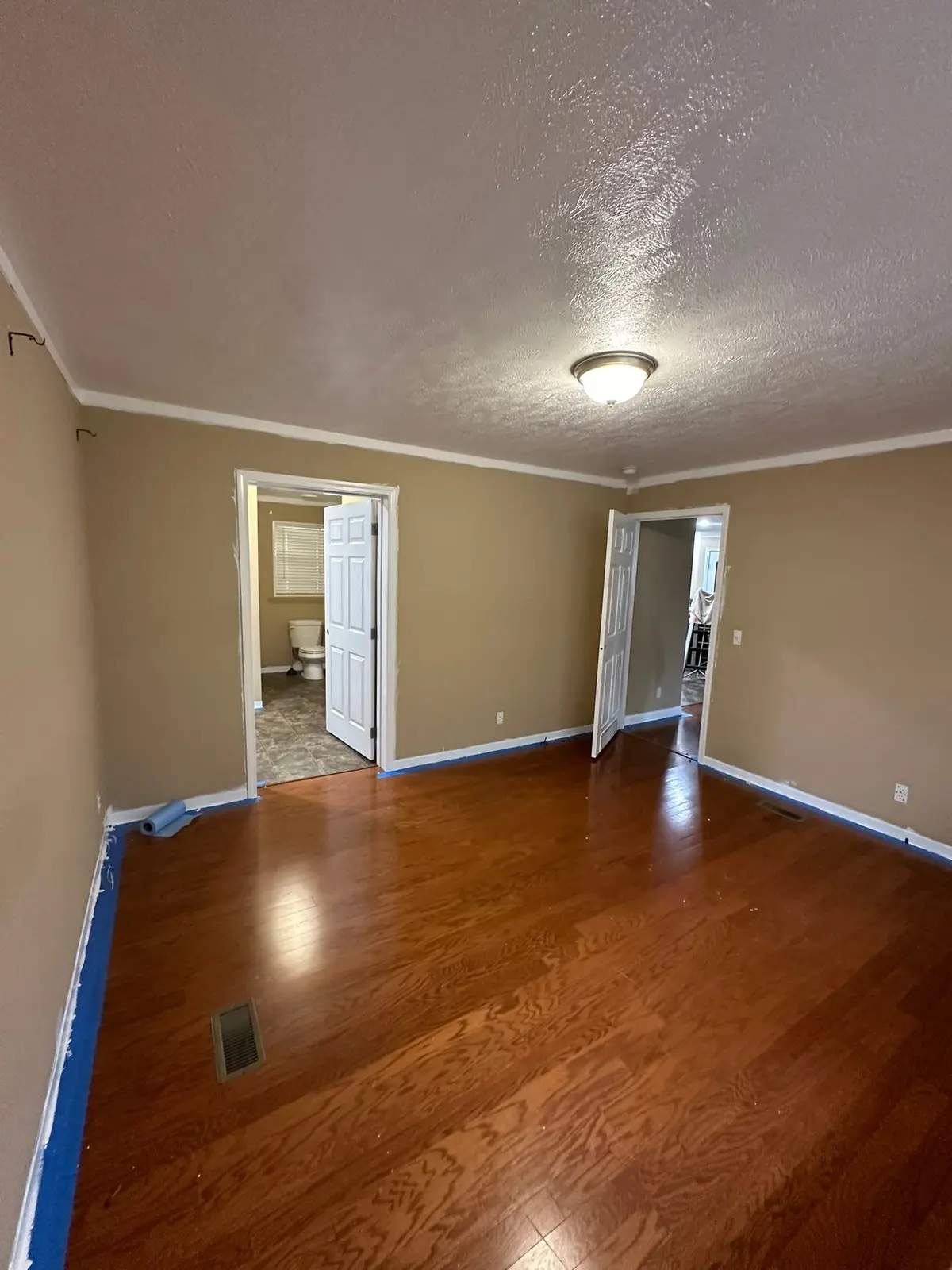 Bedrooms Carpet Replaced with Wood-Look Floor — finished photo 2