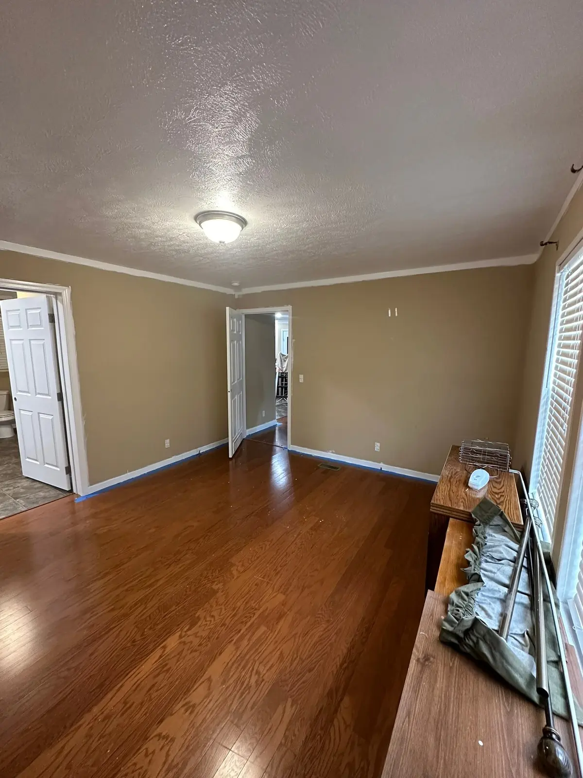 Bedrooms Carpet Replaced with Wood-Look Floor — finished photo 3