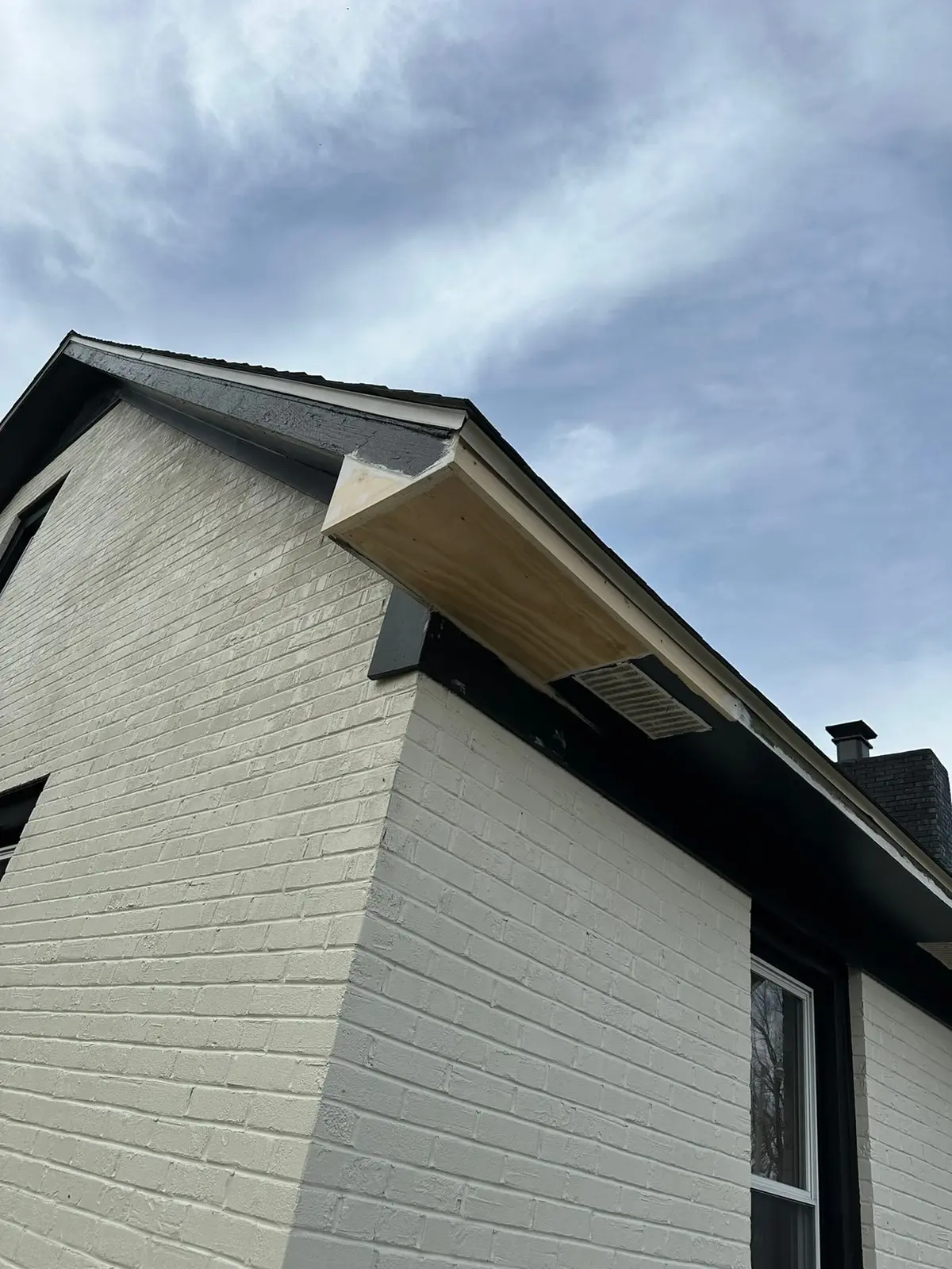New Eave Returns on Painted Brick House