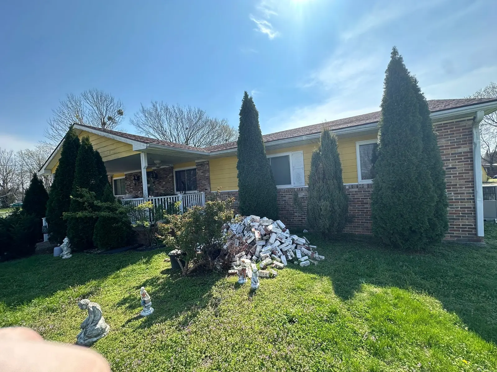 Yellow Ranch House Re-Sided in Navy Blue — Before photo 6
