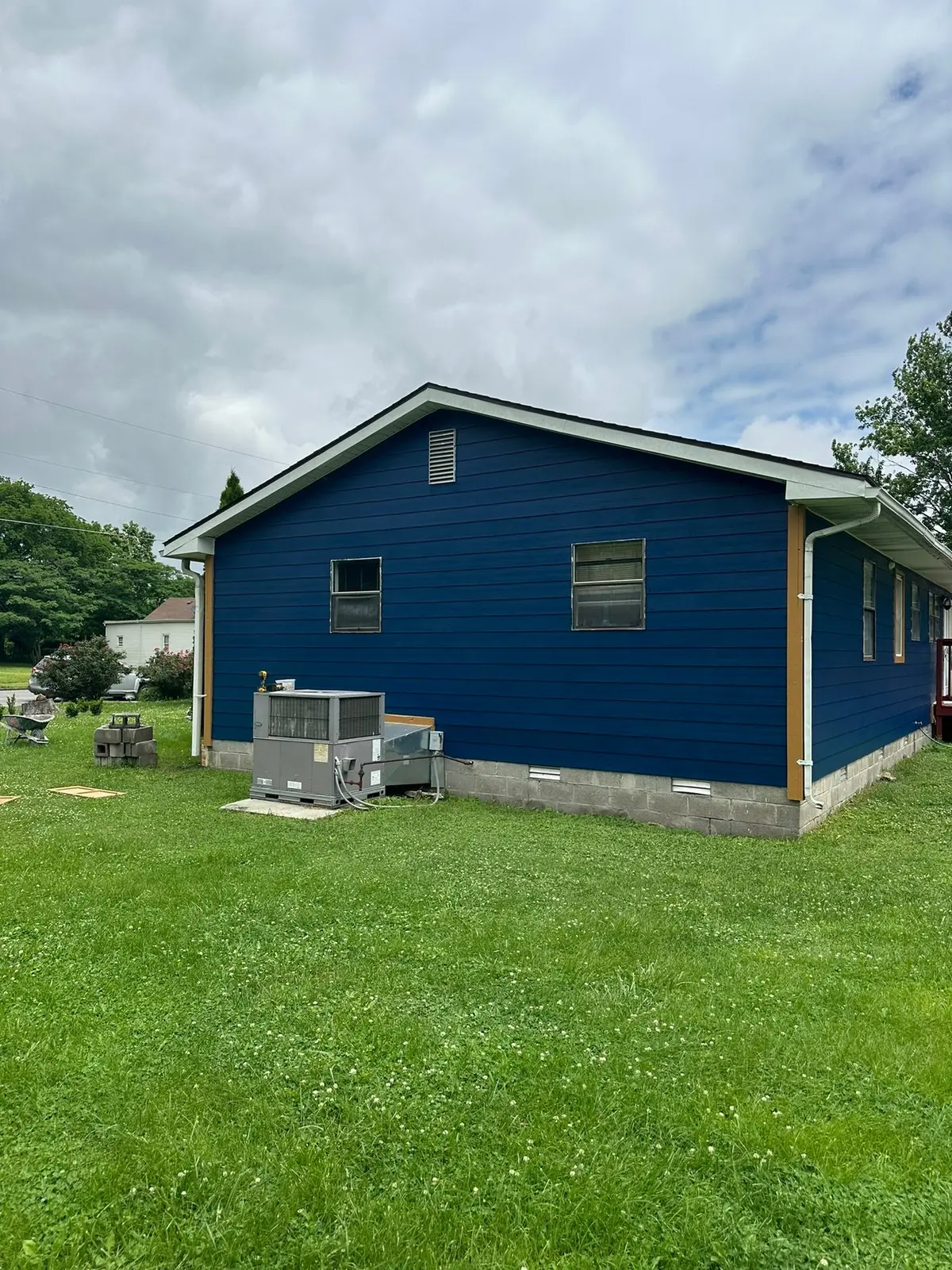 Yellow Ranch House Re-Sided in Navy Blue — finished photo 7