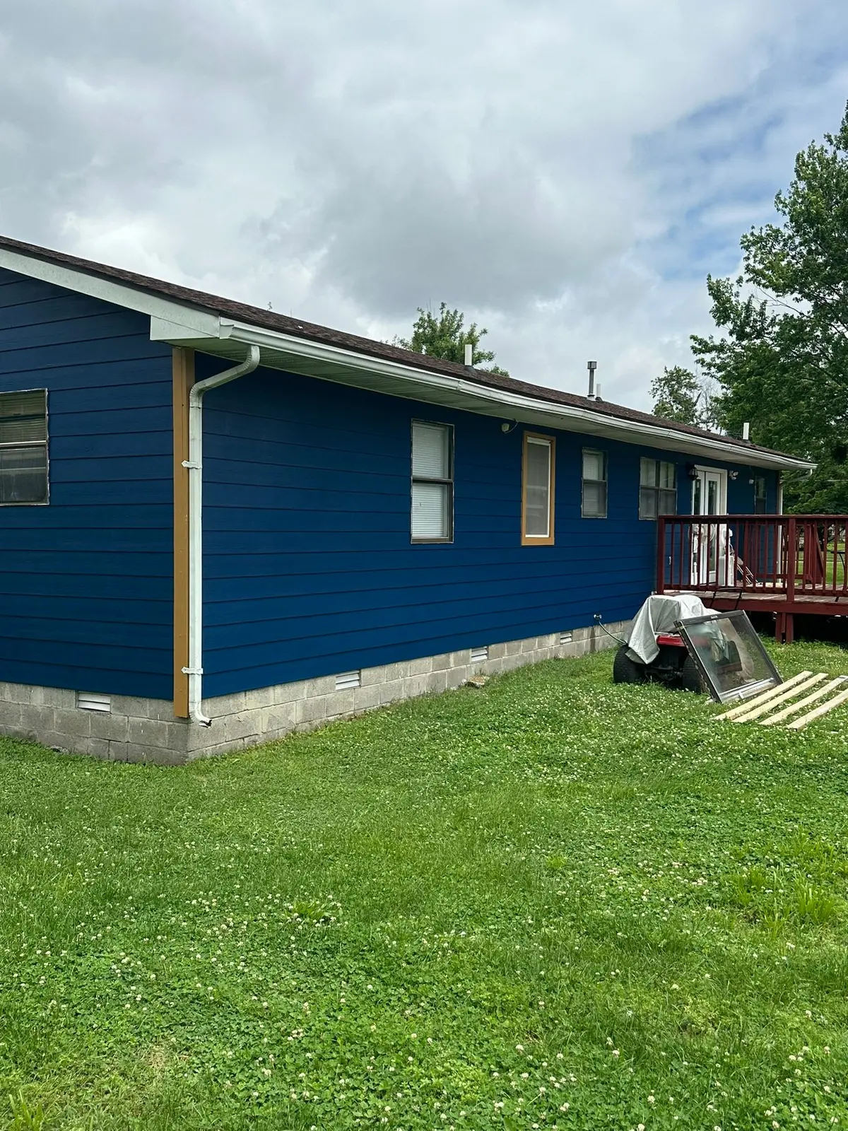 Yellow Ranch House Re-Sided in Navy Blue — finished photo 9
