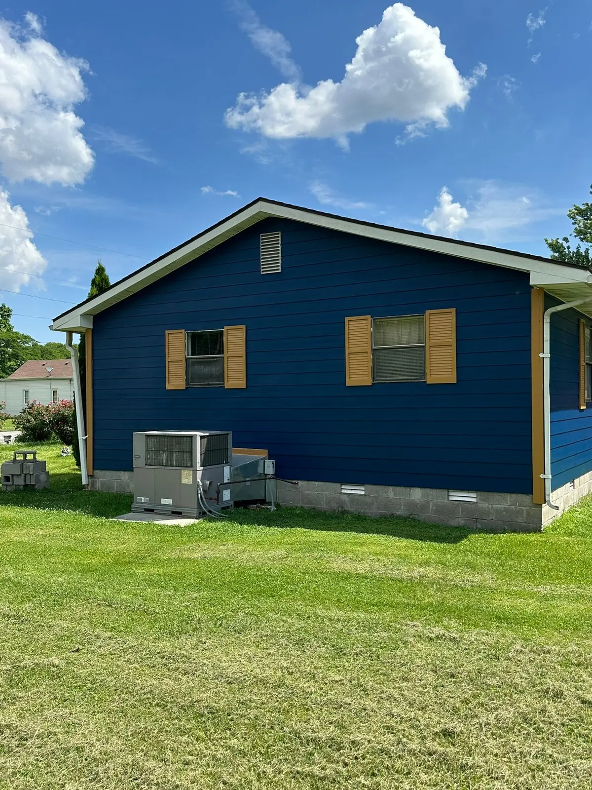 Yellow Ranch House Re-Sided in Navy Blue — finished photo 4