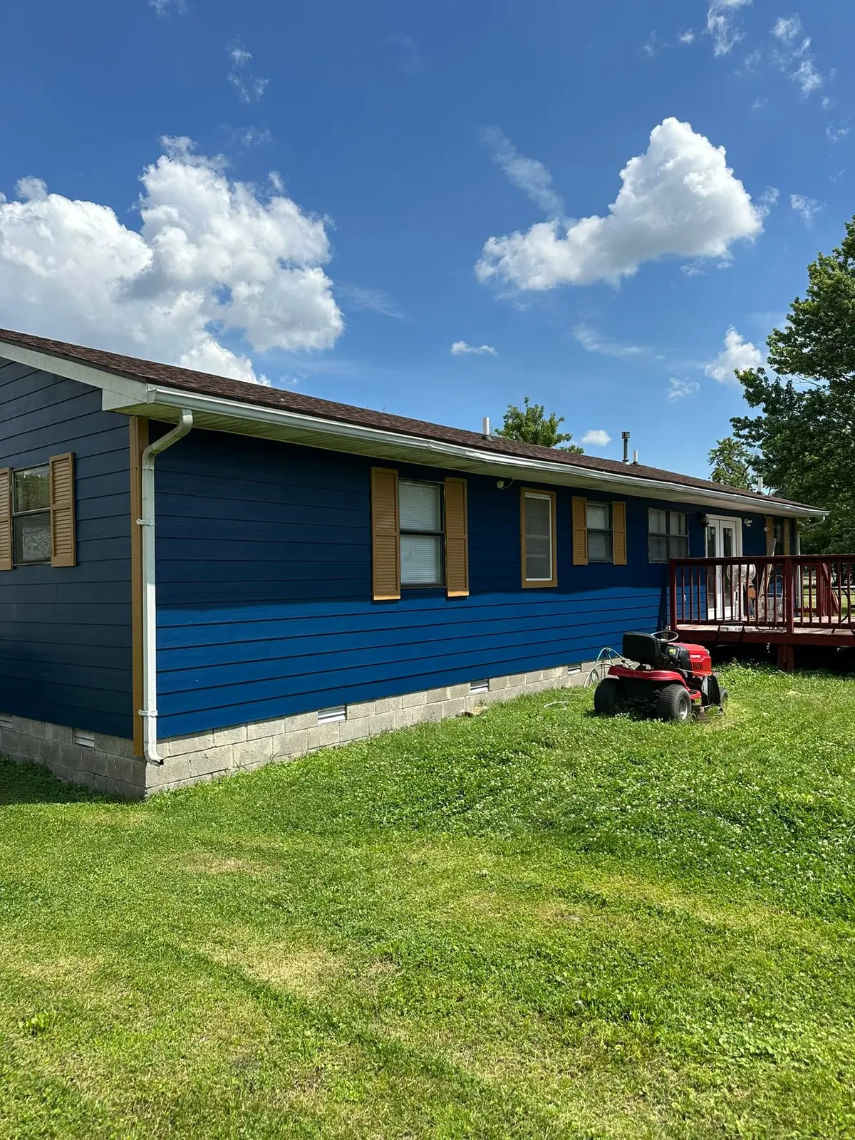 Yellow Ranch House Re-Sided in Navy Blue — finished photo 5