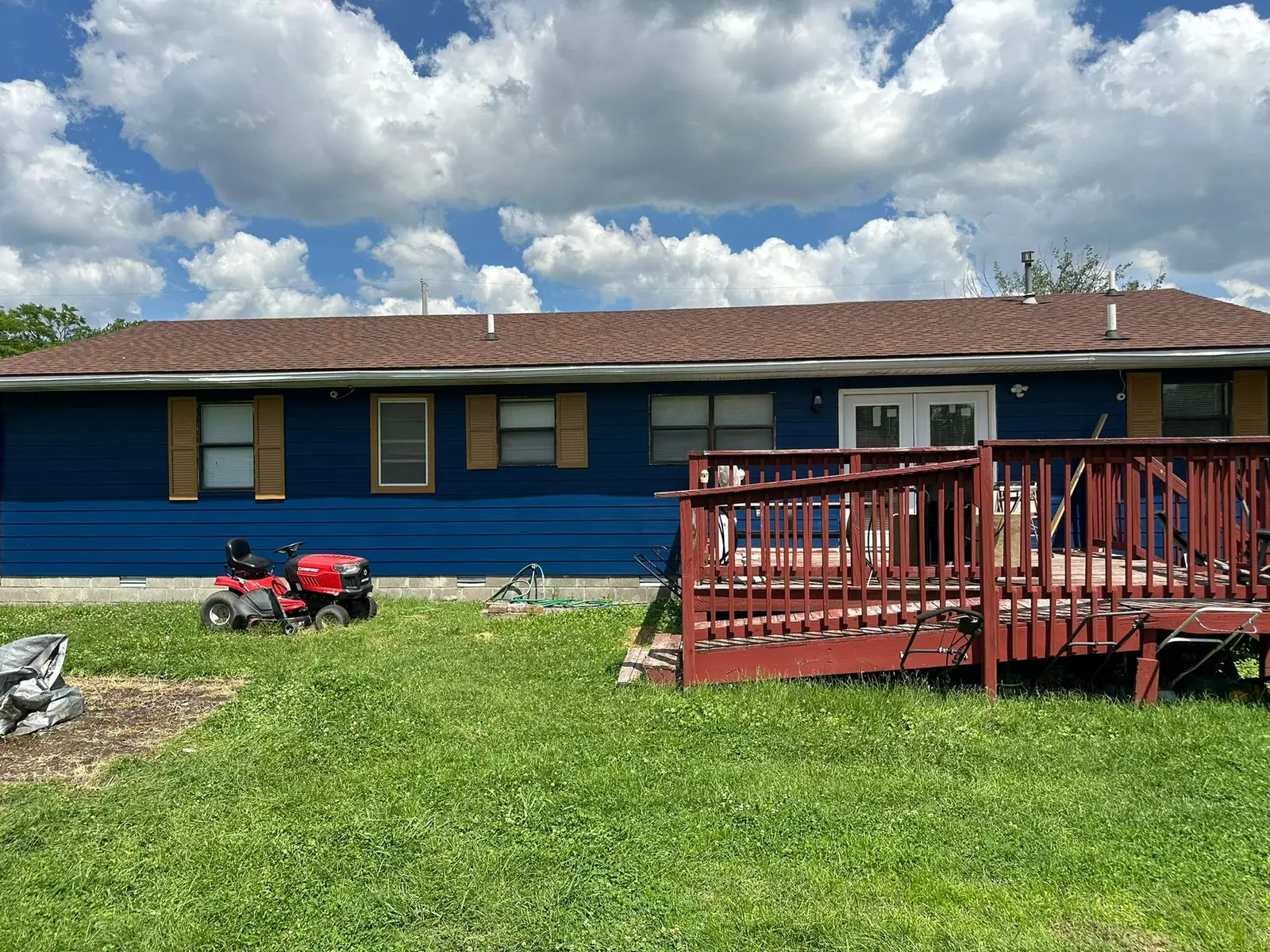 Yellow Ranch House Re-Sided in Navy Blue — finished photo 3