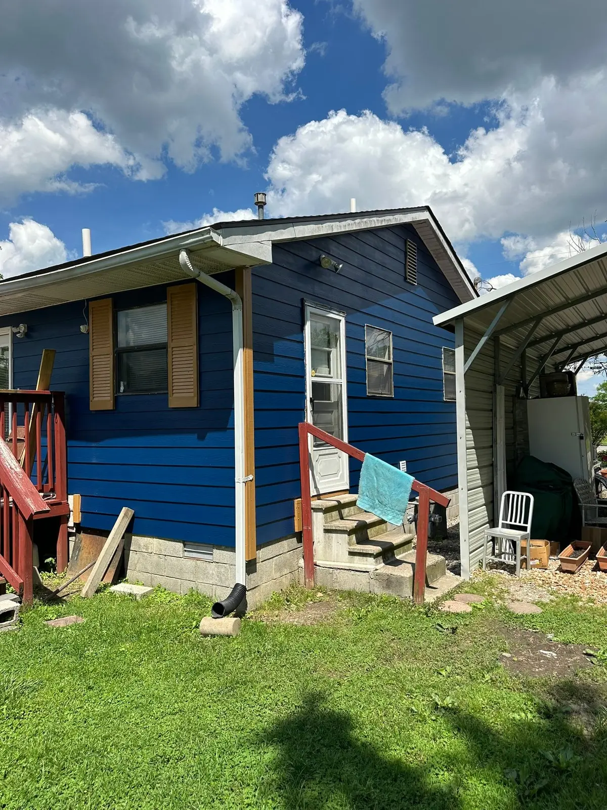 Yellow Ranch House Re-Sided in Navy Blue — finished photo 6