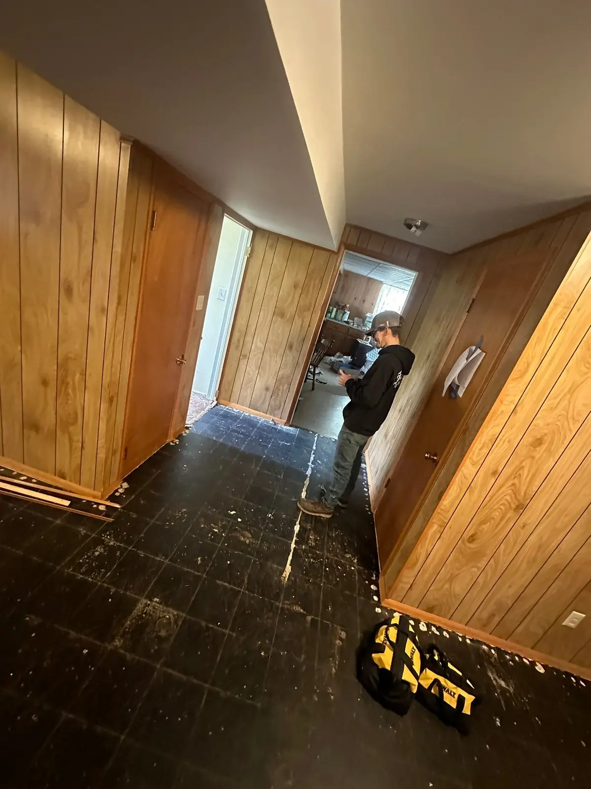 Lower-Level Remodel, Paneling to Drywall with New Floor — Demo photo 5