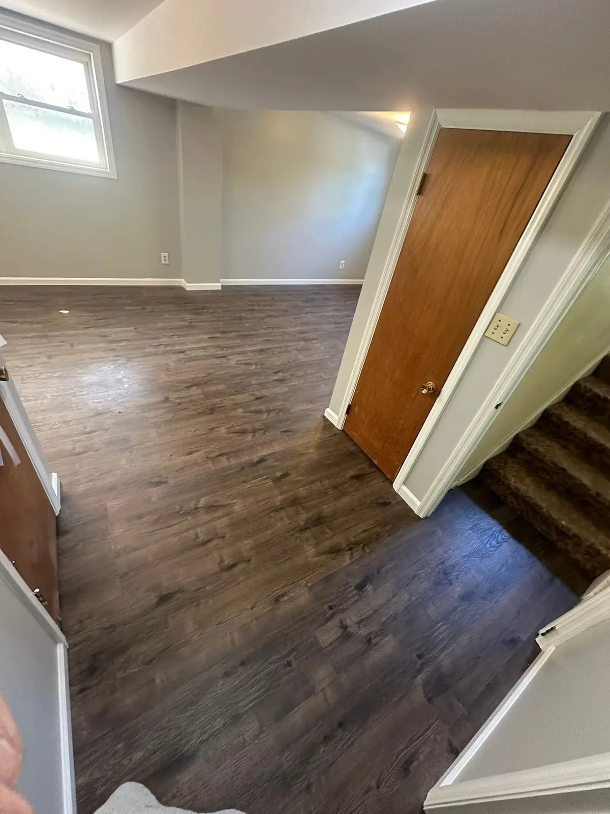 Lower-Level Remodel, Paneling to Drywall with New Floor — finished photo 5