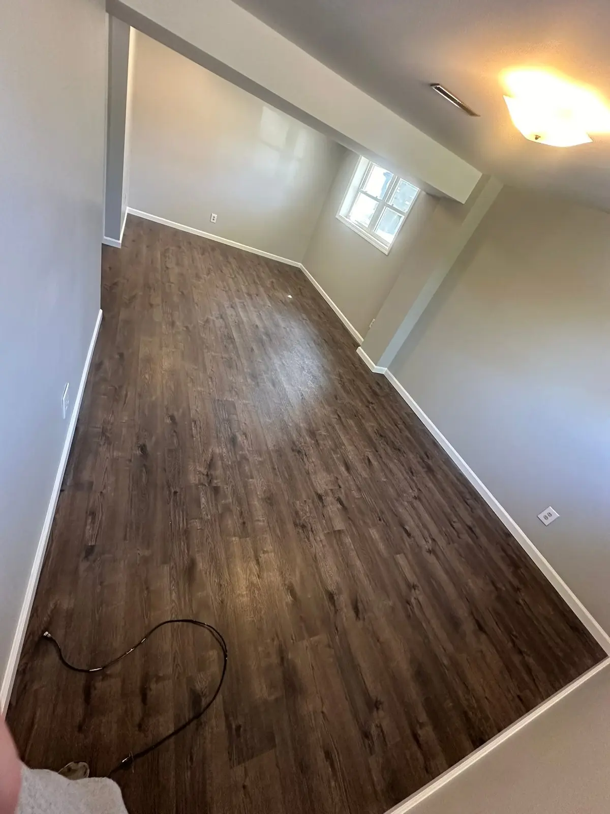 Lower-Level Remodel, Paneling to Drywall with New Floor — finished photo 4