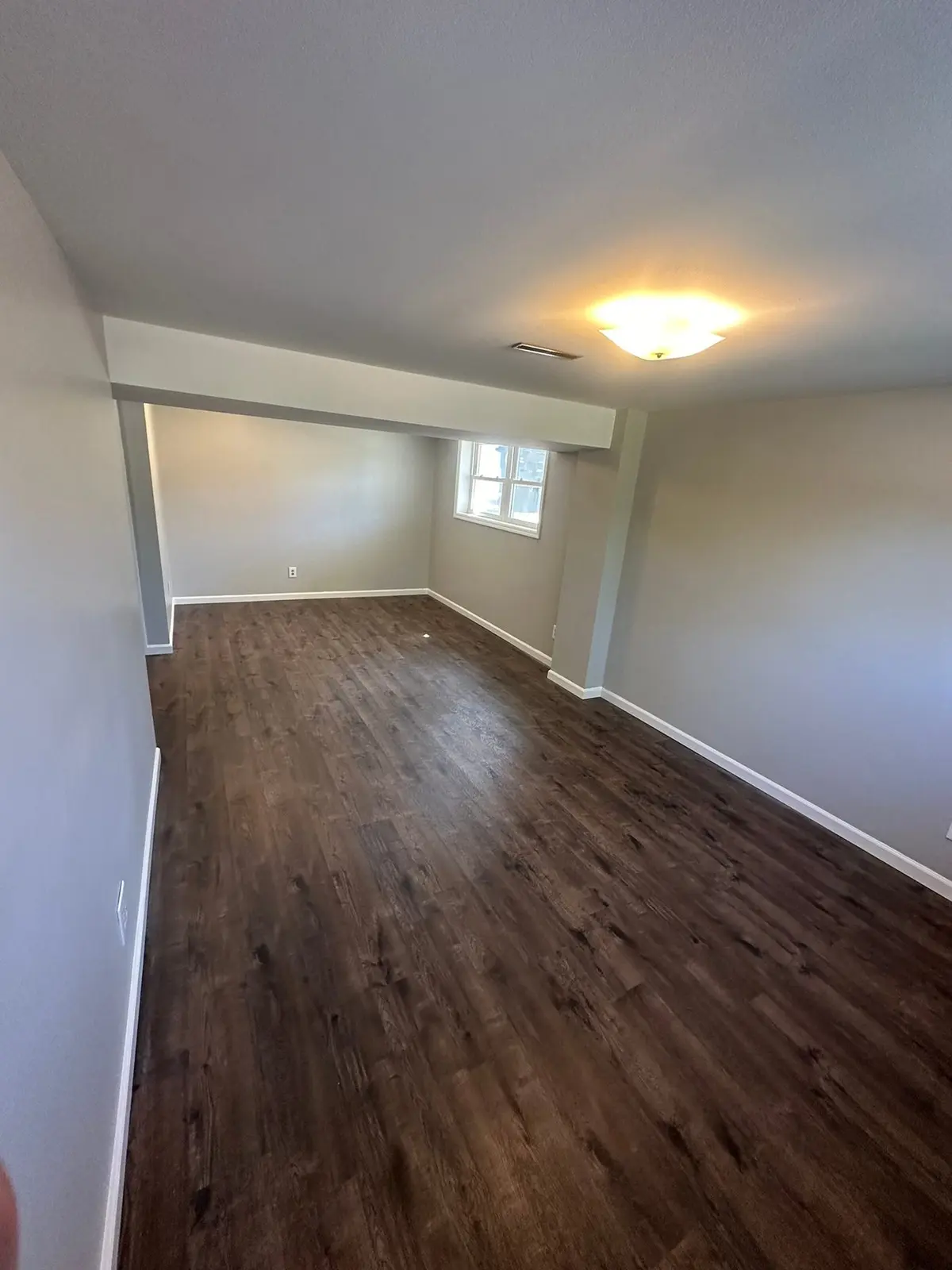Lower-Level Remodel, Paneling to Drywall with New Floor — finished photo 7