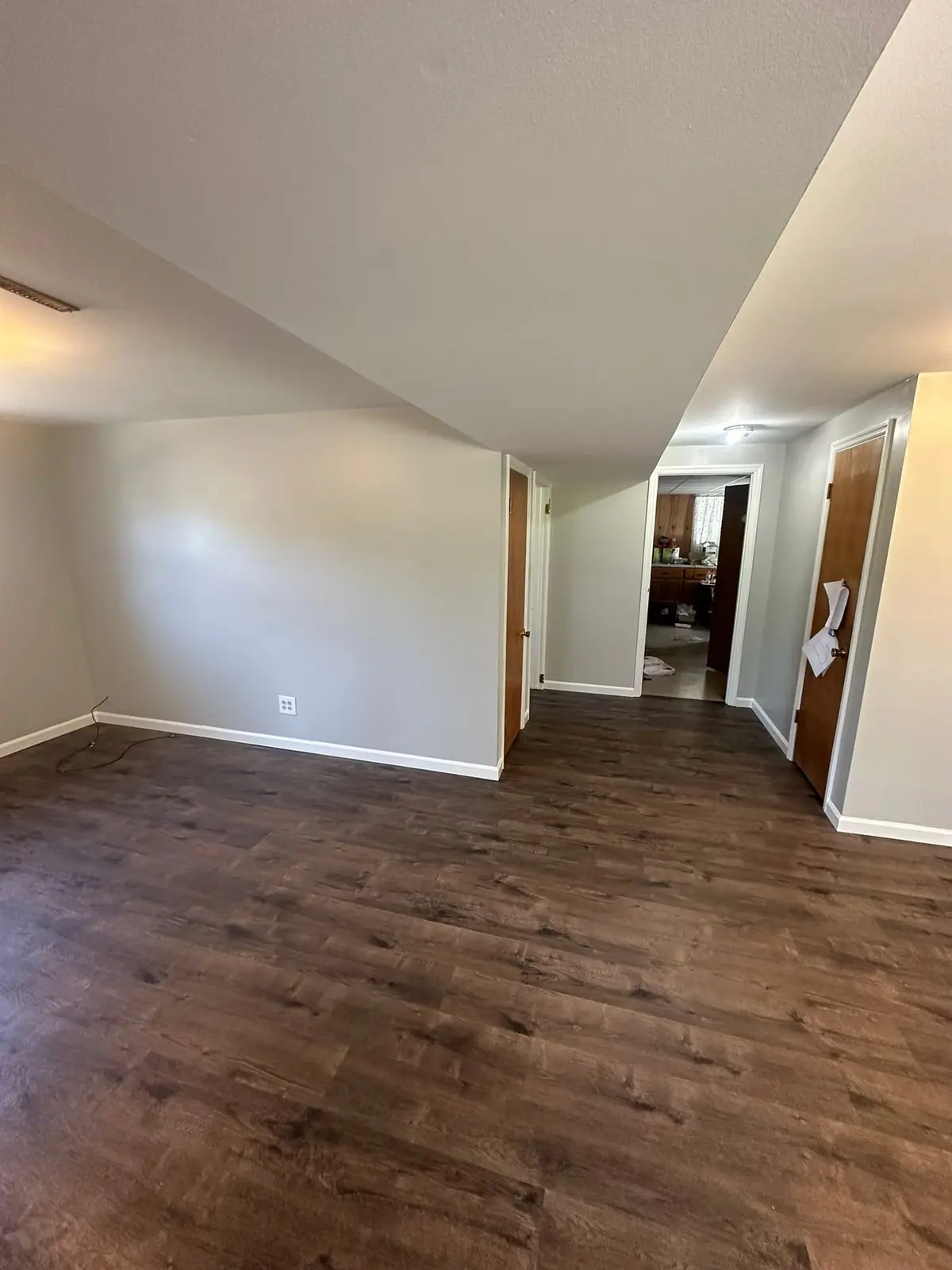 Lower-Level Remodel, Paneling to Drywall with New Floor — finished photo 3