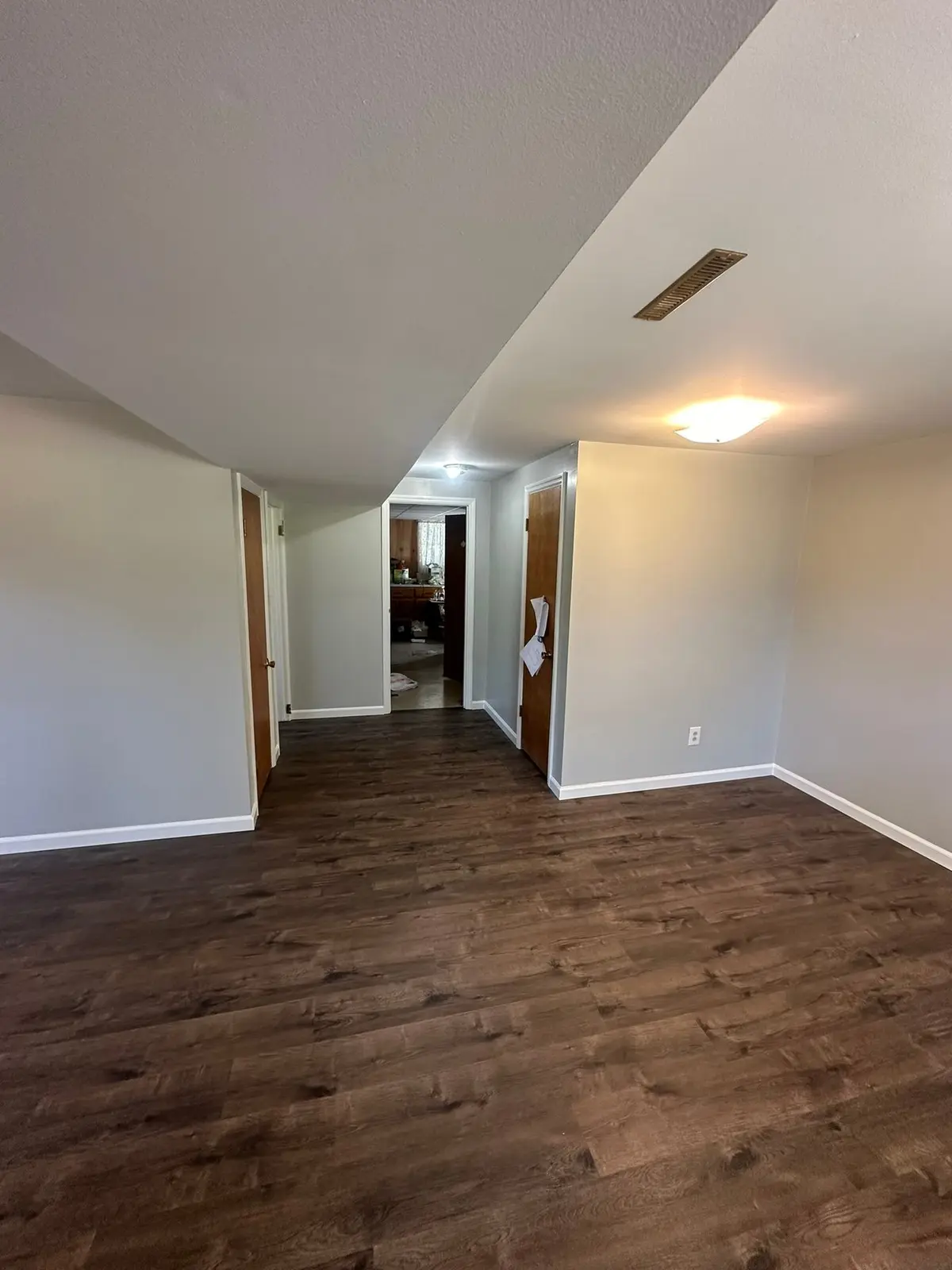Lower-Level Remodel, Paneling to Drywall with New Floor — finished photo 9