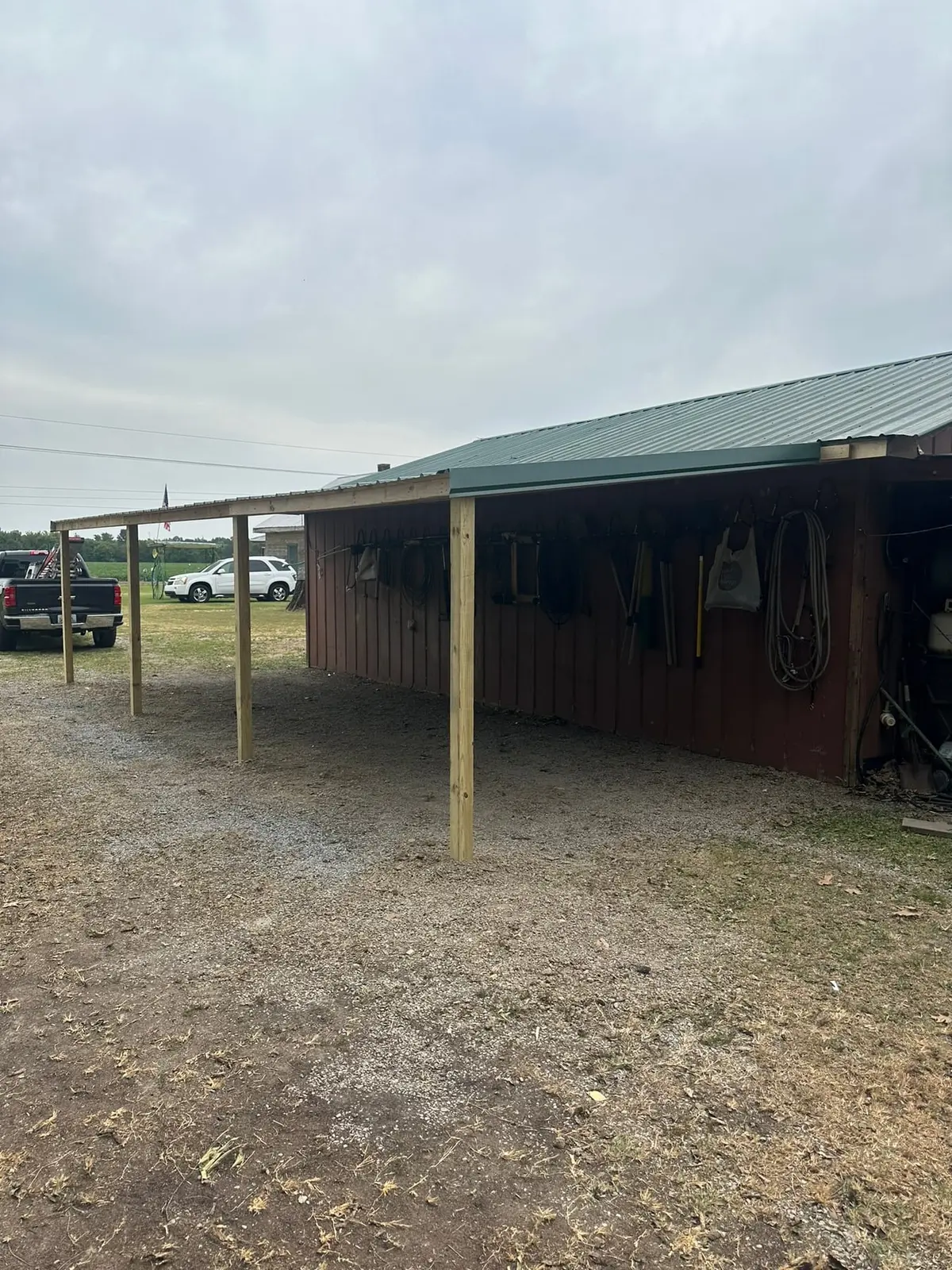 Barn Lean-To Rebuilt with Metal Roof