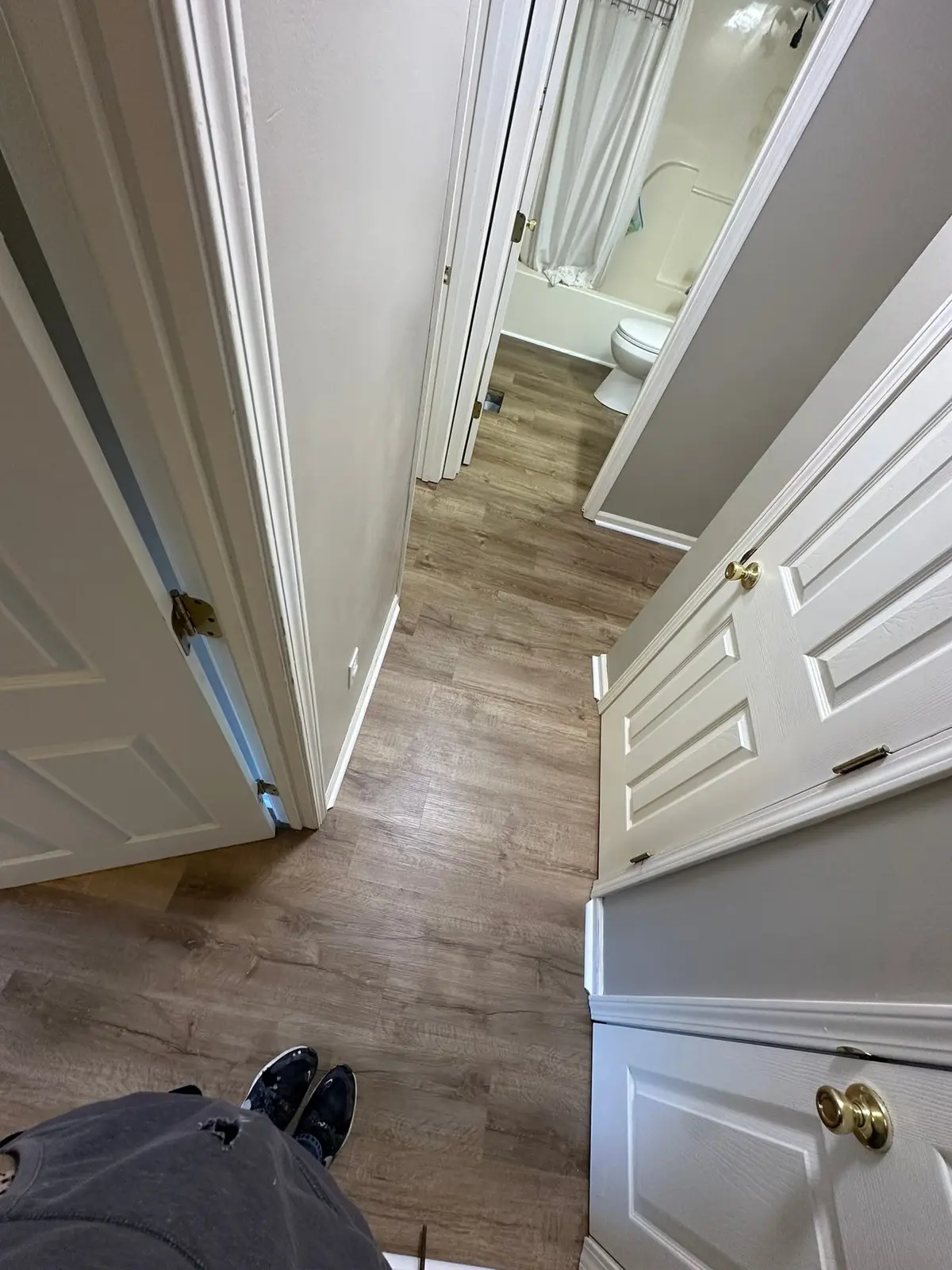 Whole-House Floor Tear-Out, New Subfloor and Wood-Look Plank — finished photo 11