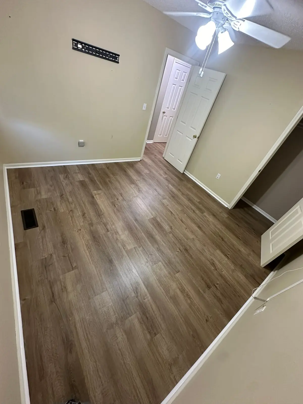 Whole-House Floor Tear-Out, New Subfloor and Wood-Look Plank — finished photo 8