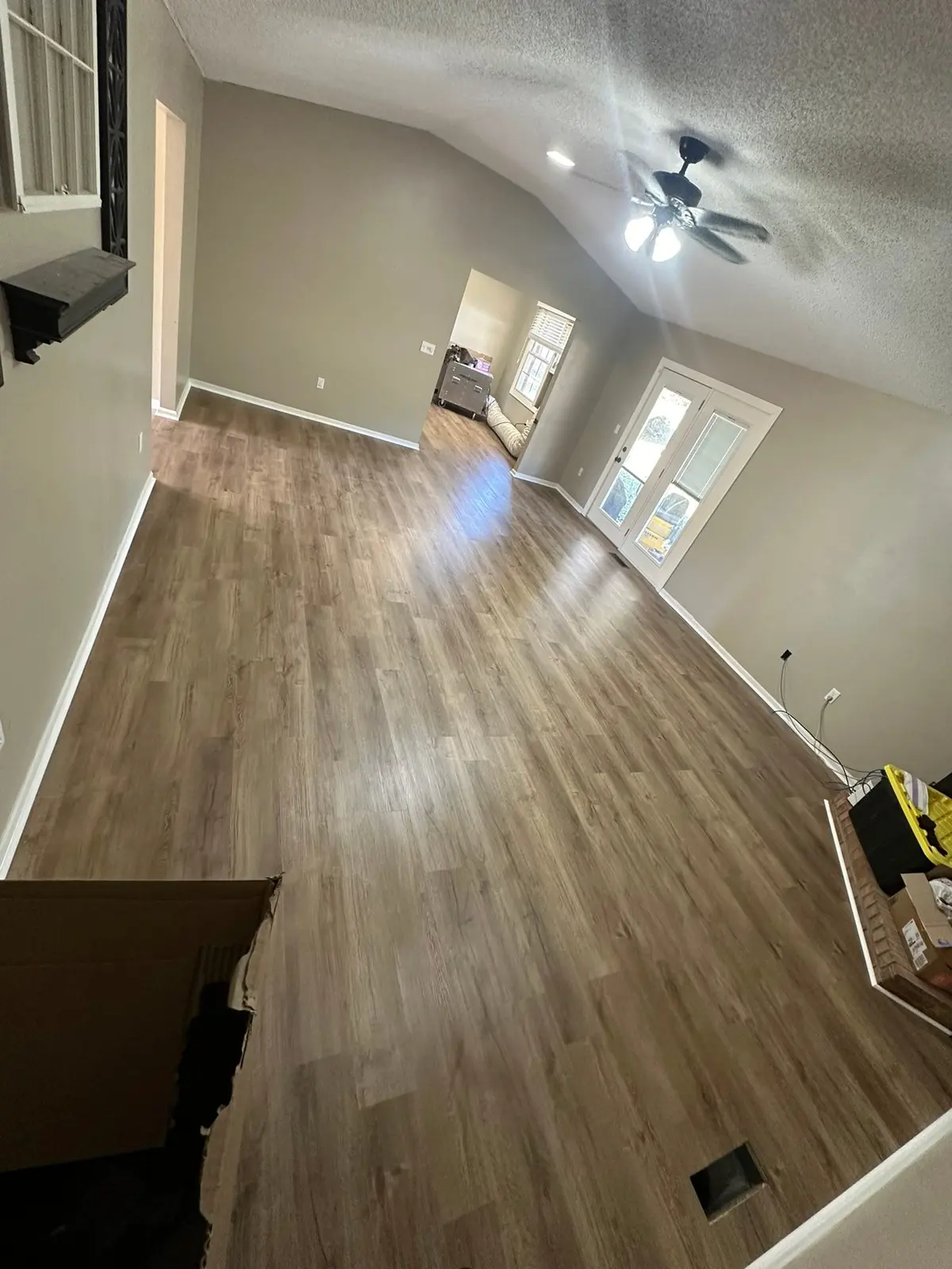 Whole-House Floor Tear-Out, New Subfloor and Wood-Look Plank — finished photo 2