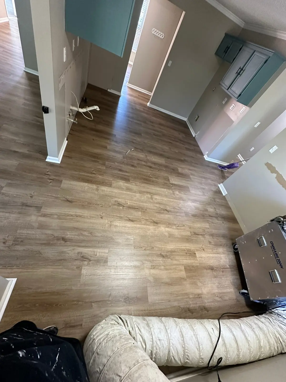 Whole-House Floor Tear-Out, New Subfloor and Wood-Look Plank — finished photo 14