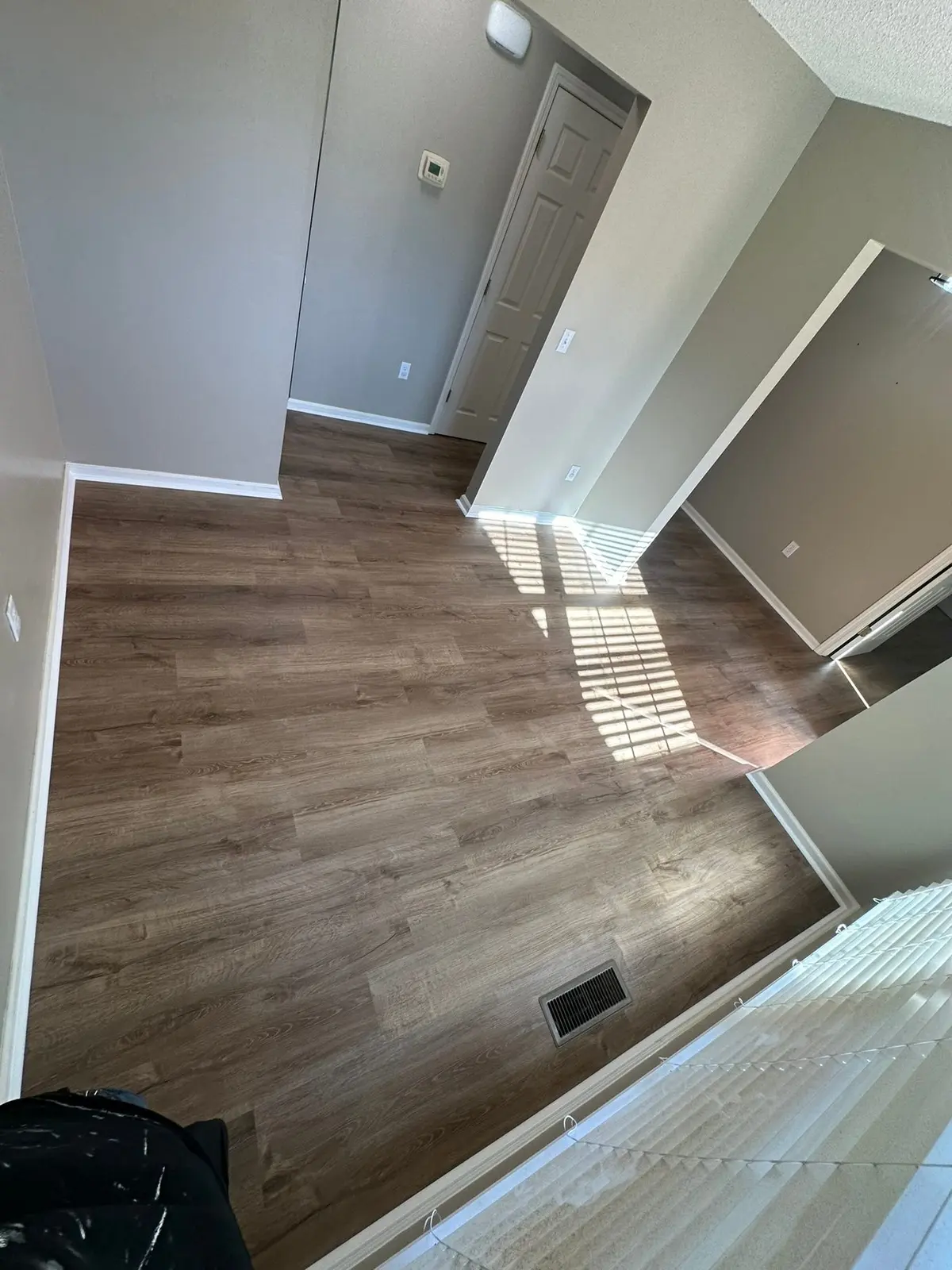 Whole-House Floor Tear-Out, New Subfloor and Wood-Look Plank — finished photo 15