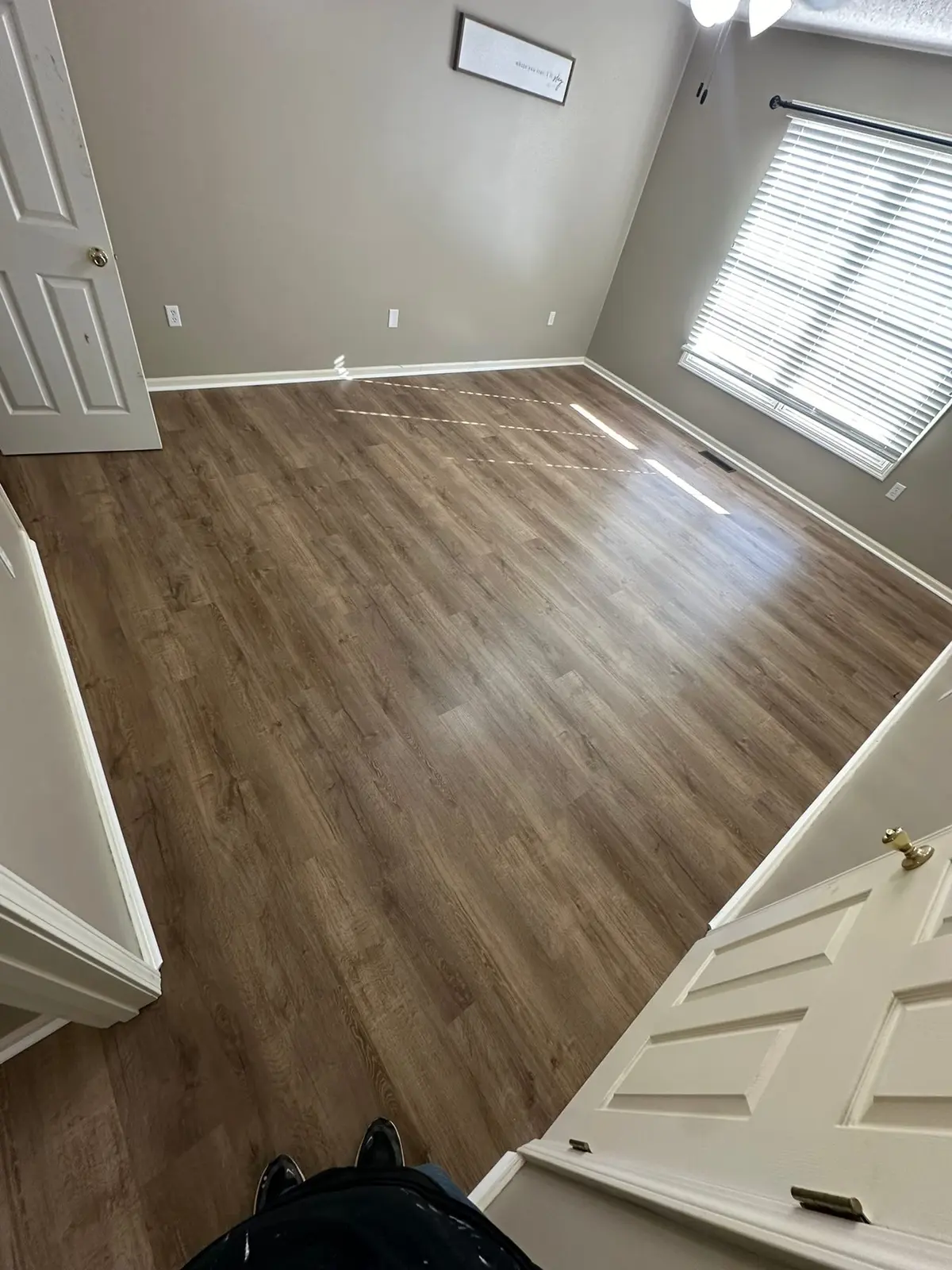 Whole-House Floor Tear-Out, New Subfloor and Wood-Look Plank — finished photo 5