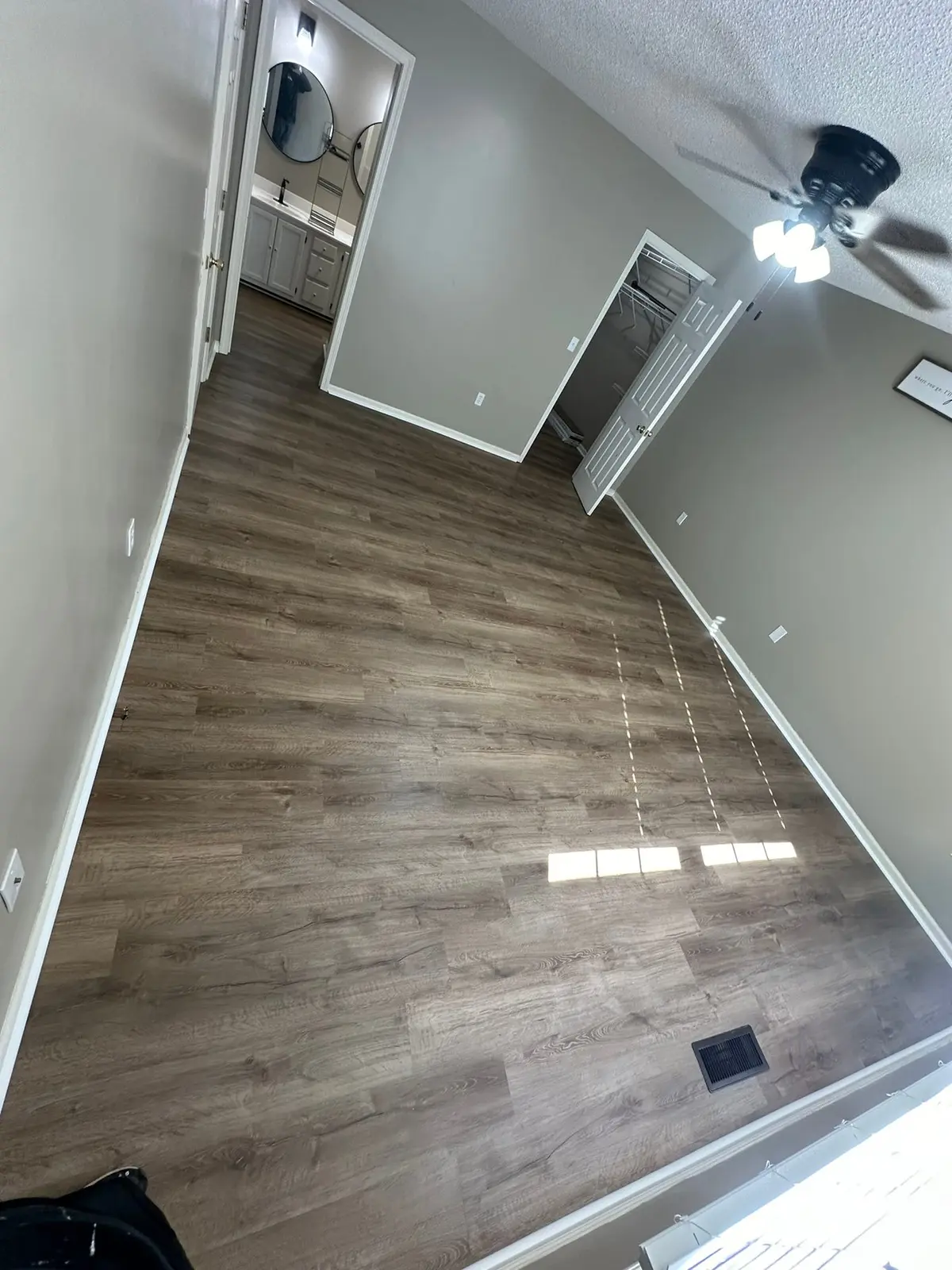 Whole-House Floor Tear-Out, New Subfloor and Wood-Look Plank — finished photo 6
