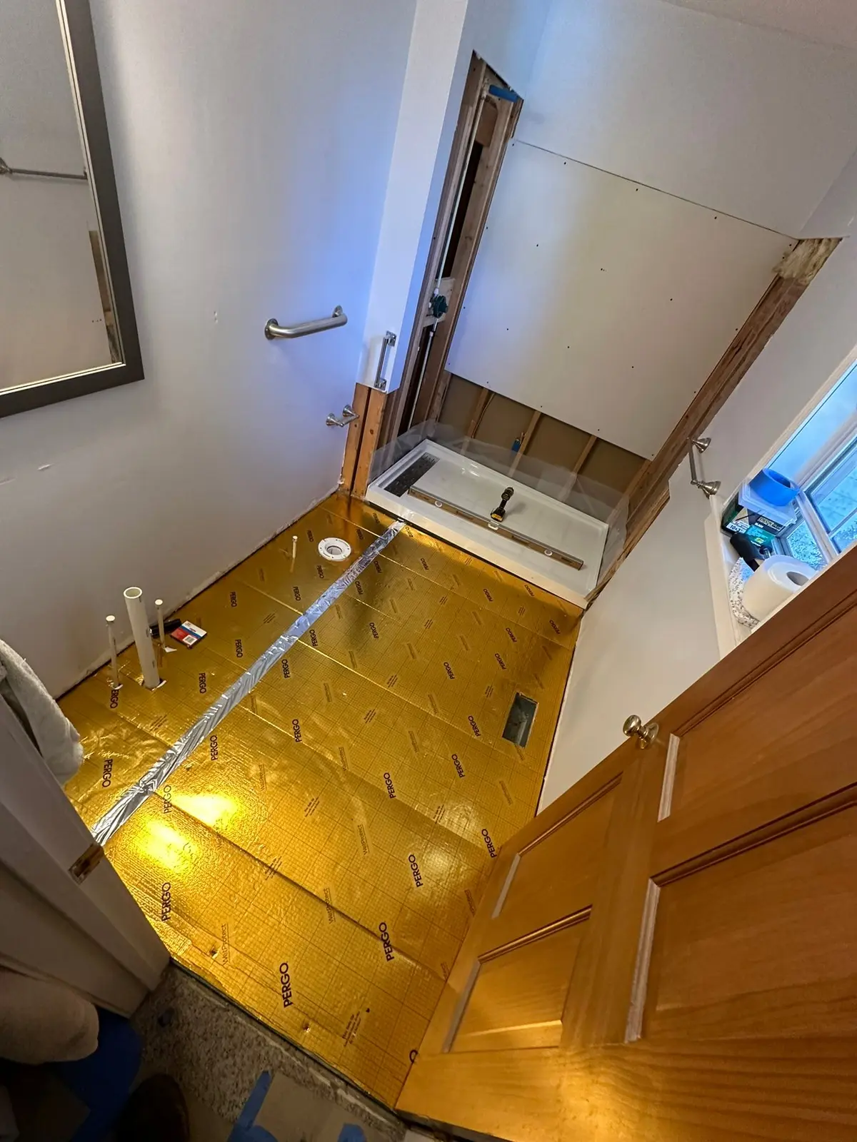 During work — Bathroom with Grab Bars and Plank Floor