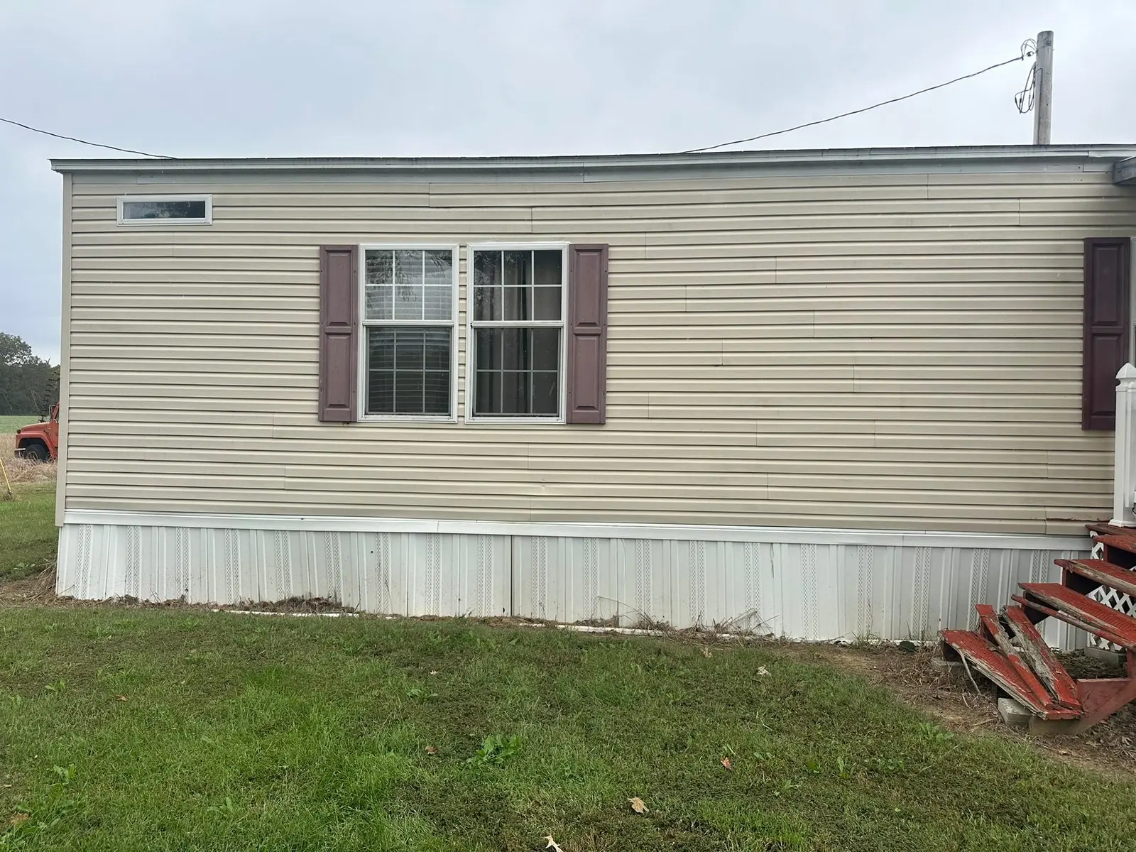 Mobile Home Wall Rebuild — Before photo 1