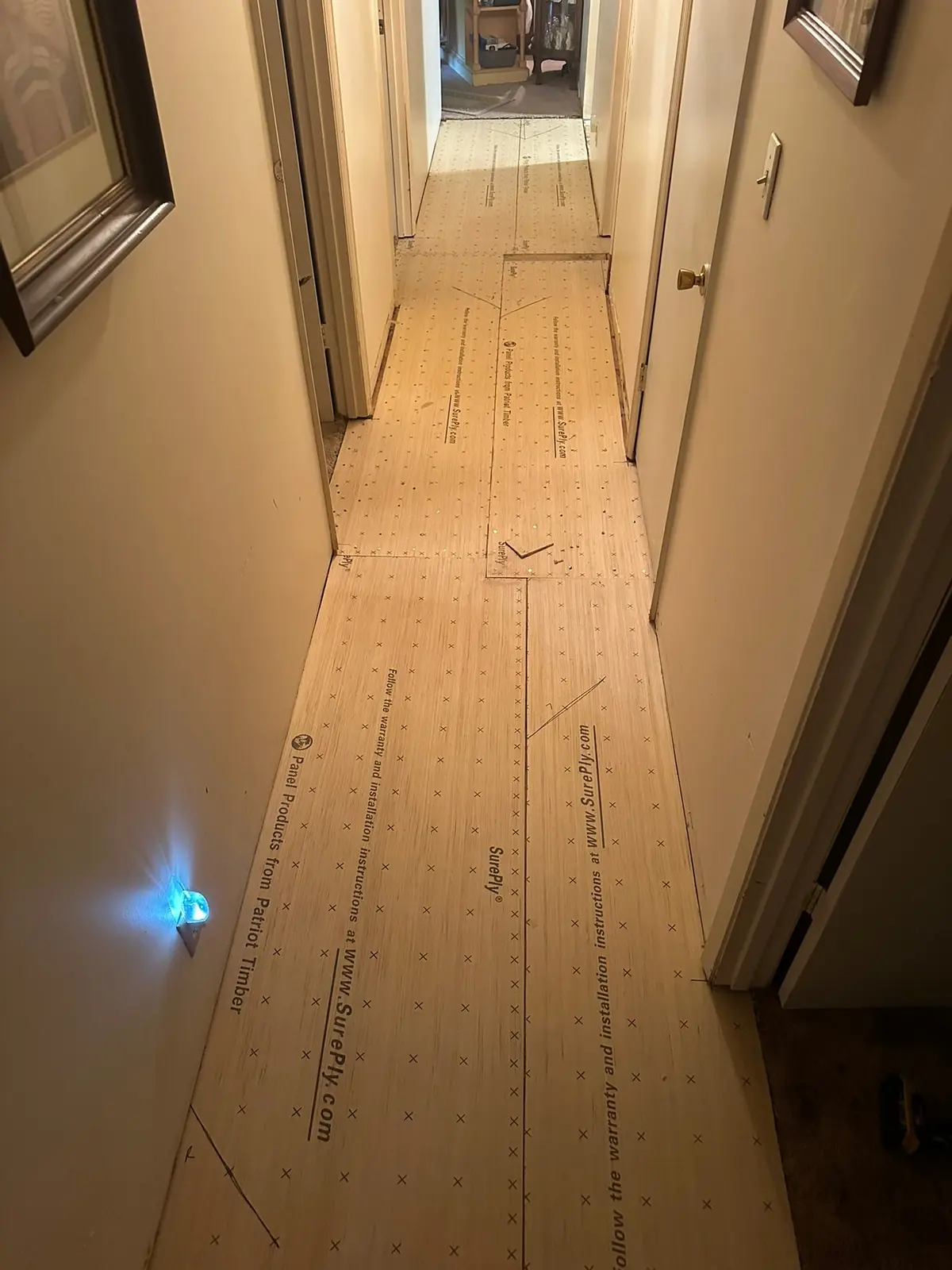 Light Wood-Look Plank in Hall, Kitchen and Living Room — Progress photo 1