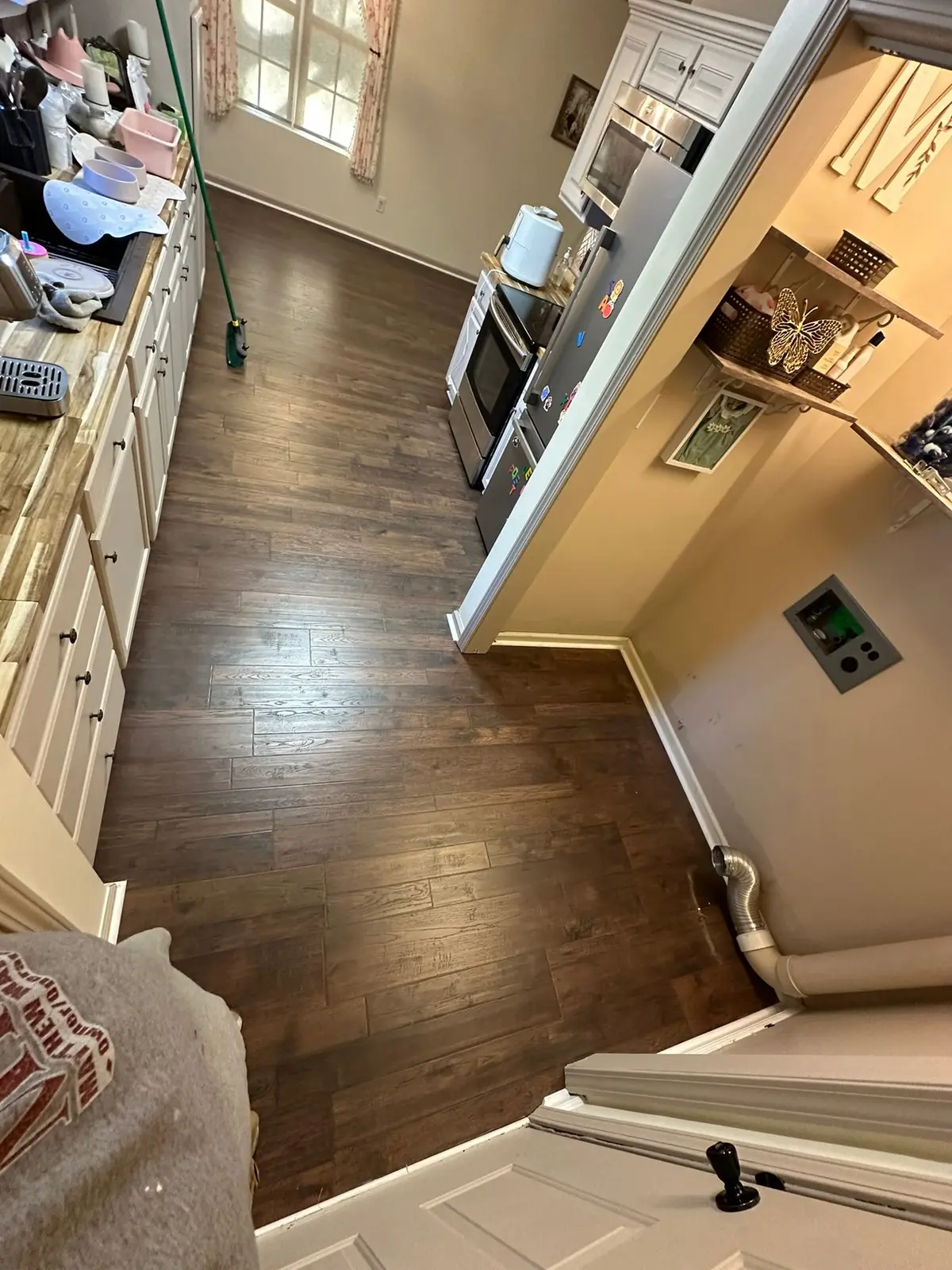 Dark Wood-Look Plank Through Main Living Areas — finished photo 7