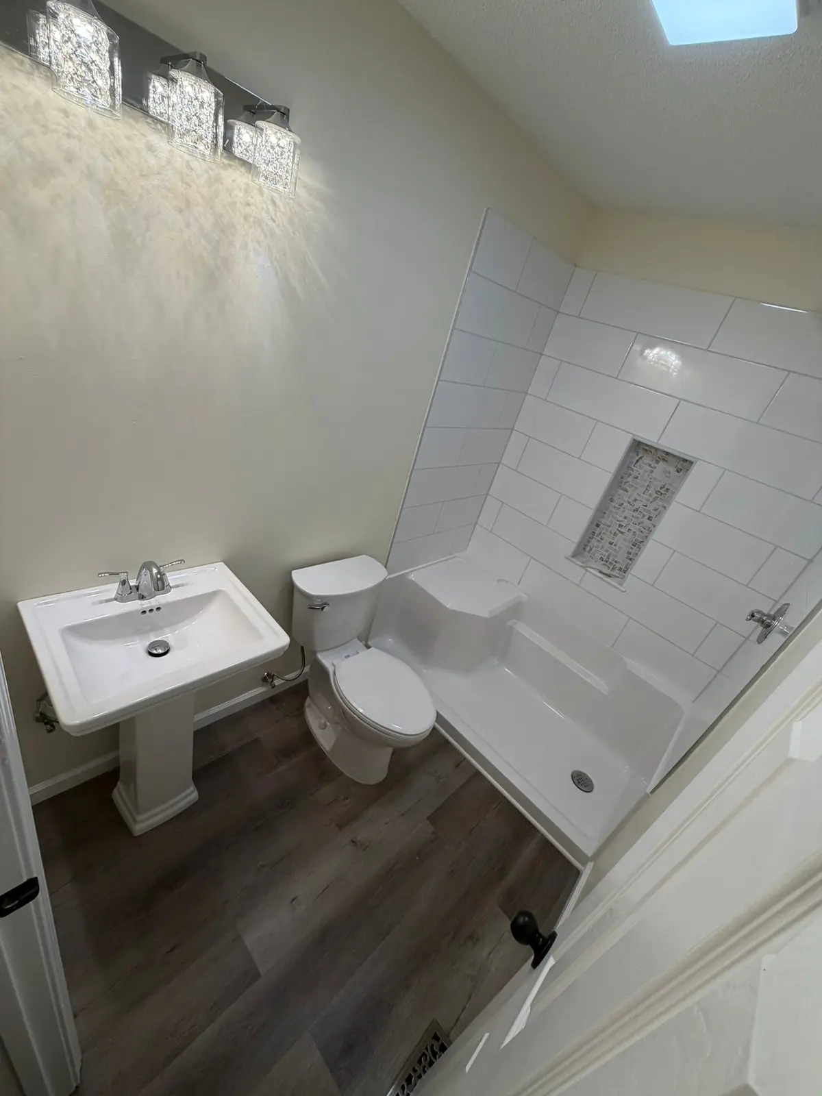 Tiled Shower with Seat and New Plank Floor — finished photo 5