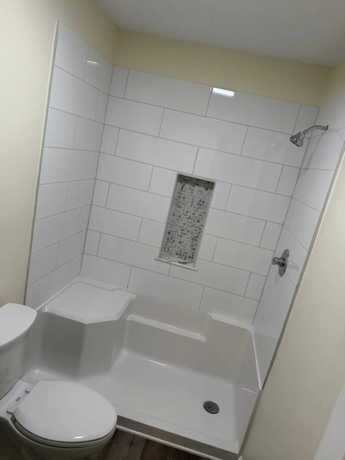 Tiled Shower with Seat and New Plank Floor — finished photo 2