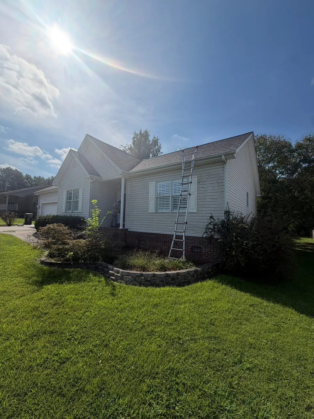 Vinyl-Sided House Washing and Exterior Photos — Progress photo 1